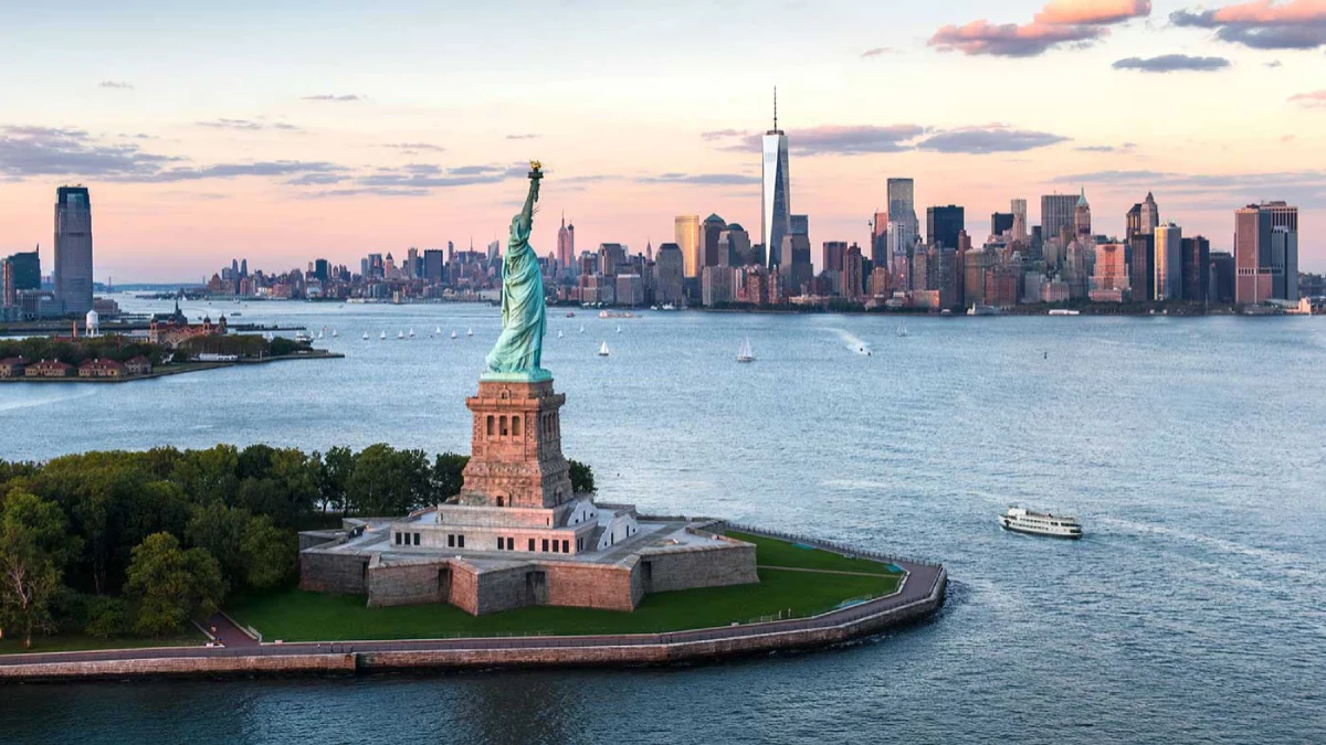 Aerial view of the Statue of Liberty with the New York City skyline