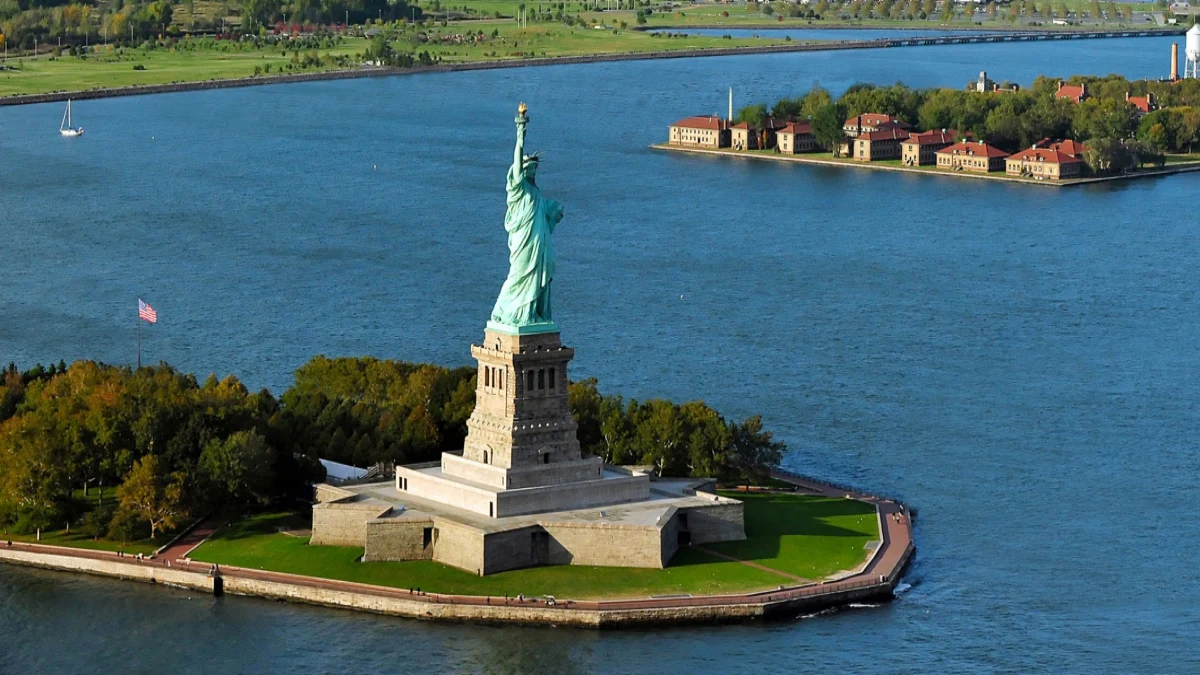 The aerial view of the Liberty Statue and Ellis Island