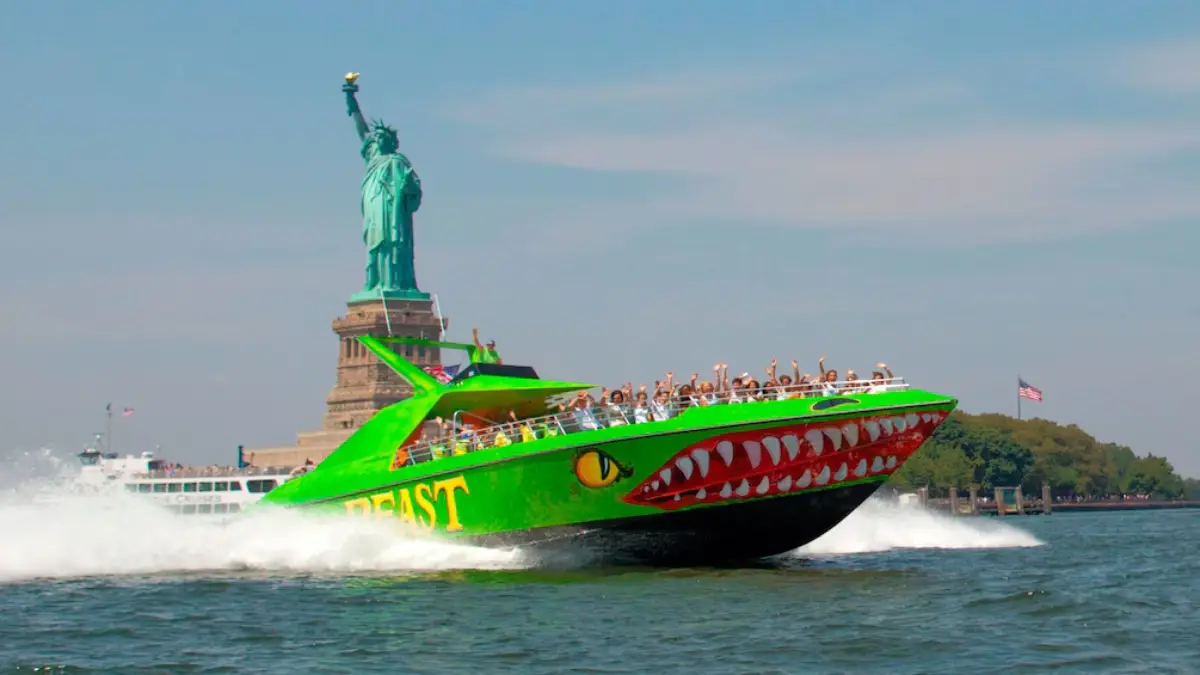 Visitors enjoying the NYC Liberty speedboat ride