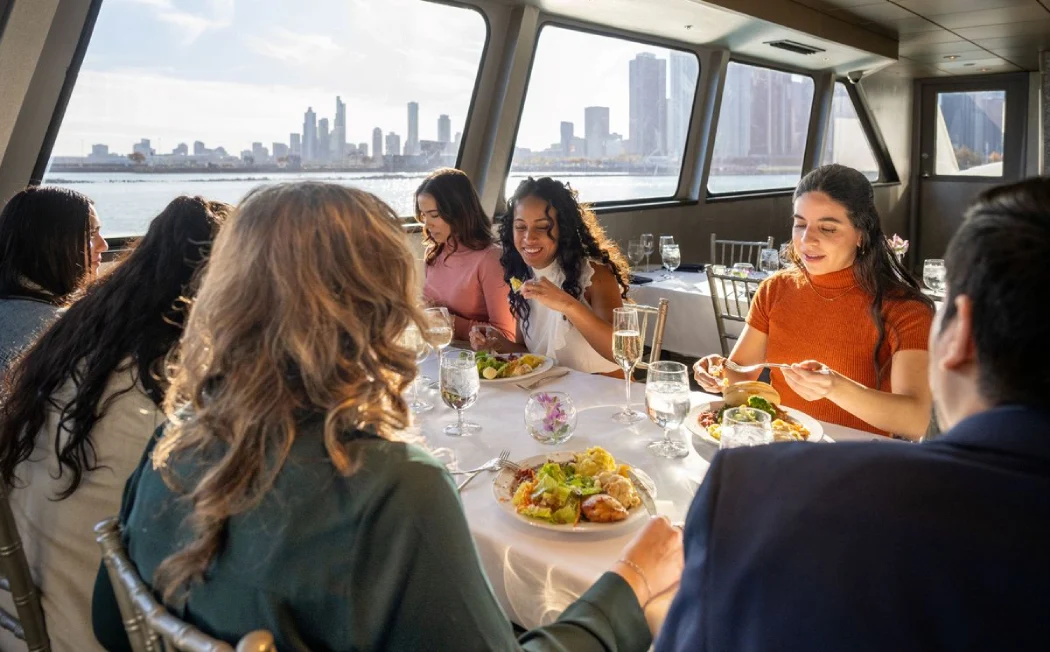 A bunch of friends enjoying lunch on the Liberty Cruise